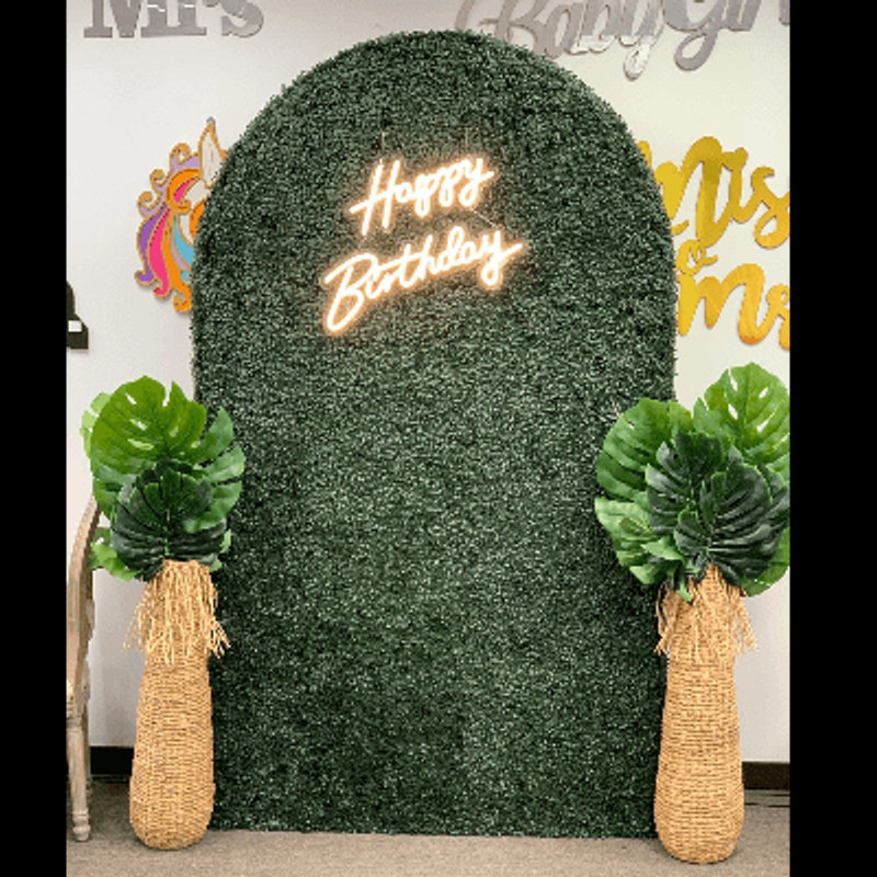 Grass wall arch with lit Happy Birthday sign